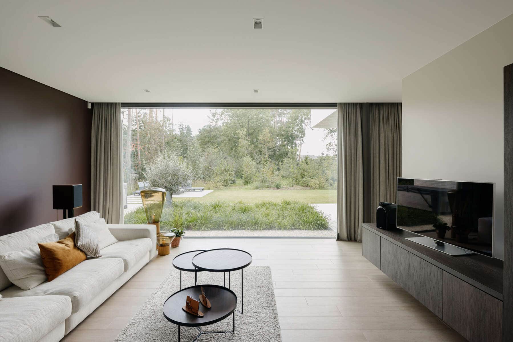 Seamless matte stretch ceiling in a modern living room
