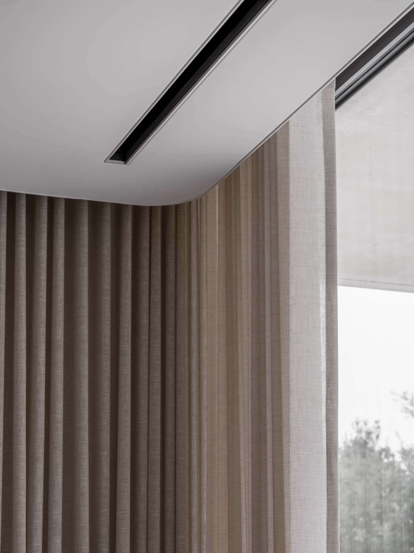 Matte polyester stretch ceiling in a bright living room